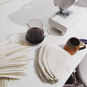 
                  
                    Load image into Gallery viewer, The Cloth Filter Co handcrafting reusable coffee cloth filters with sewing machine
                  
                